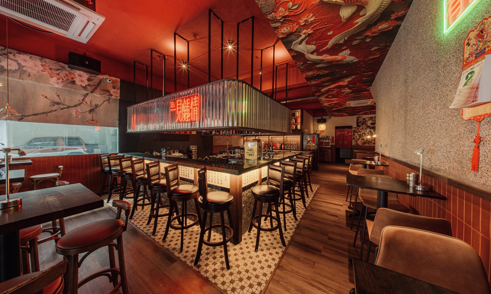 Red-lit dining room at Yi Jian Zhong Qing
